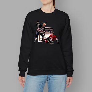 Trump Defeating Justin Trudeau Funny Hockey Shirt